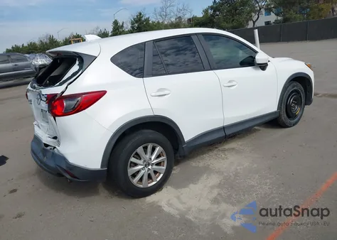 2013 Mazda Cx-5 Sport z USA, uszkodzony, nr VIN JM3KE4BE1D0154871